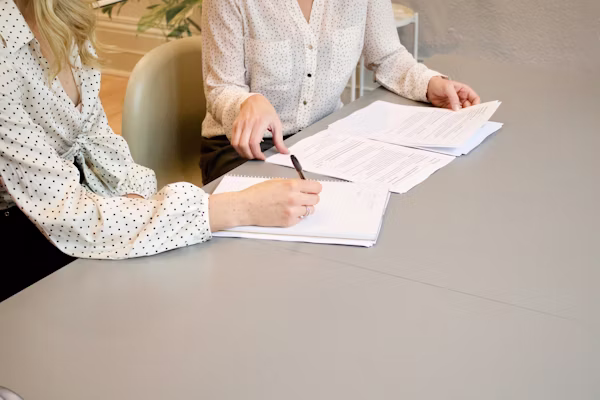 Michigan professionals in a meeting — professional liability insurance